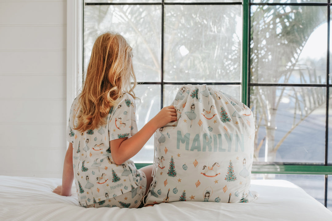 personalised santa sack with matching personalised christmas pyjamas
