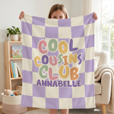 Cousin Crew Check blanket with a name added for every one of the cousins