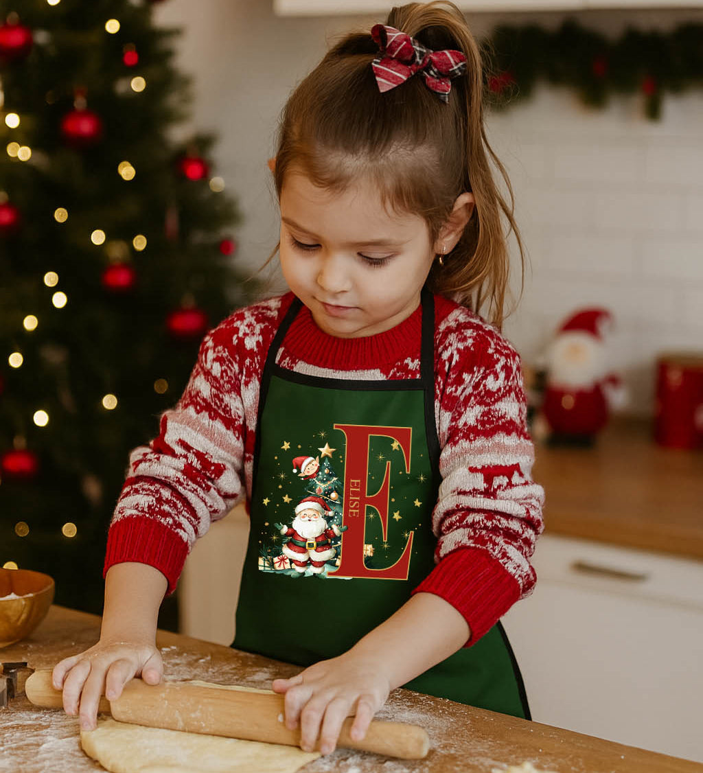 Child wearing Santa Initial Kids Apron