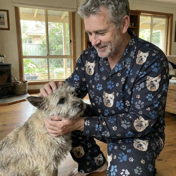 Man in pajamas with dog photo 