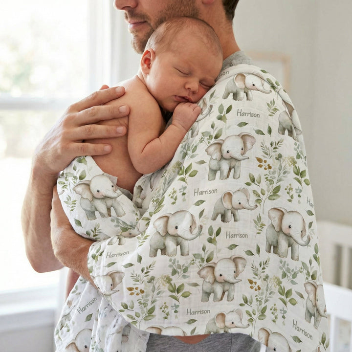 Personalised muslin swaddle wrap with custom baby name, soft breathable fabric, and 120x120cm size for newborns.