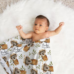 Custom printed baby swaddle wrap made from soft stretch poly fabric, personalised with baby’s name