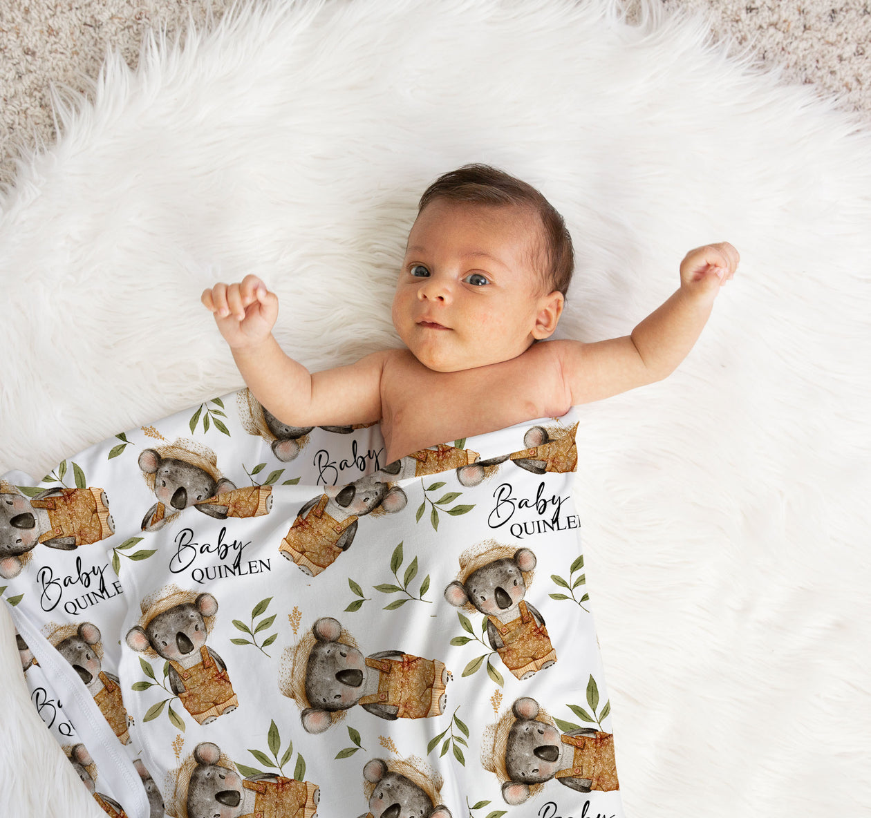 Custom printed baby swaddle wrap made from soft stretch poly fabric, personalised with baby’s name