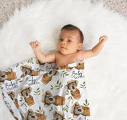 Custom printed baby swaddle wrap made from soft stretch poly fabric, personalised with baby’s name