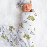 Close-up of custom name printed on personalised baby swaddle blanket by The Custom Co. baby chameleon