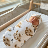 Personalised baby swaddle and beanie set made of soft stretch poly fabric for comfort and style