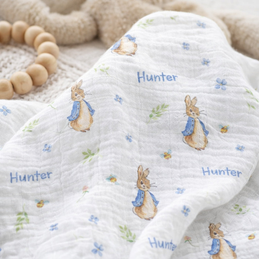 Personalised muslin swaddle wrap with baby name, soft breathable fabric, 120x120cm size for newborns and babies