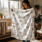 Soft personalised baby blanket with custom edge-to-edge print and plain white reverse side.