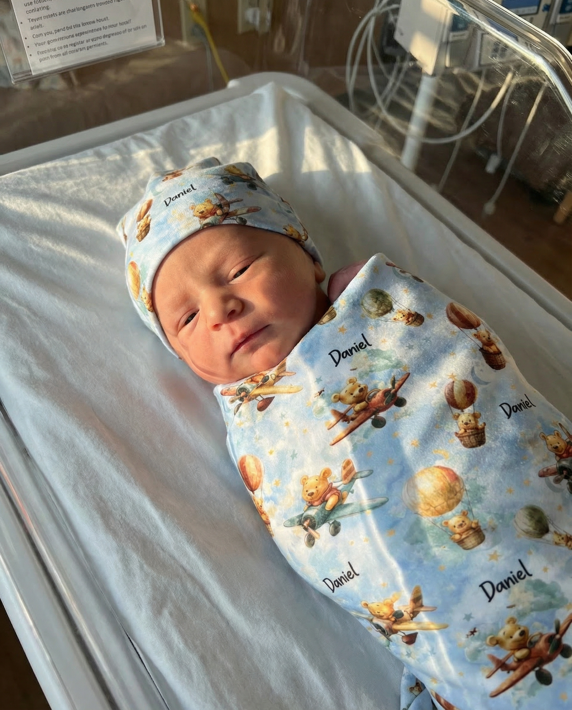 Personalised swaddle and beanie set made from soft stretch poly fabric for newborns