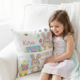 Personalised pink Easter pocket book cushion with bunny design and built-in book pocket
