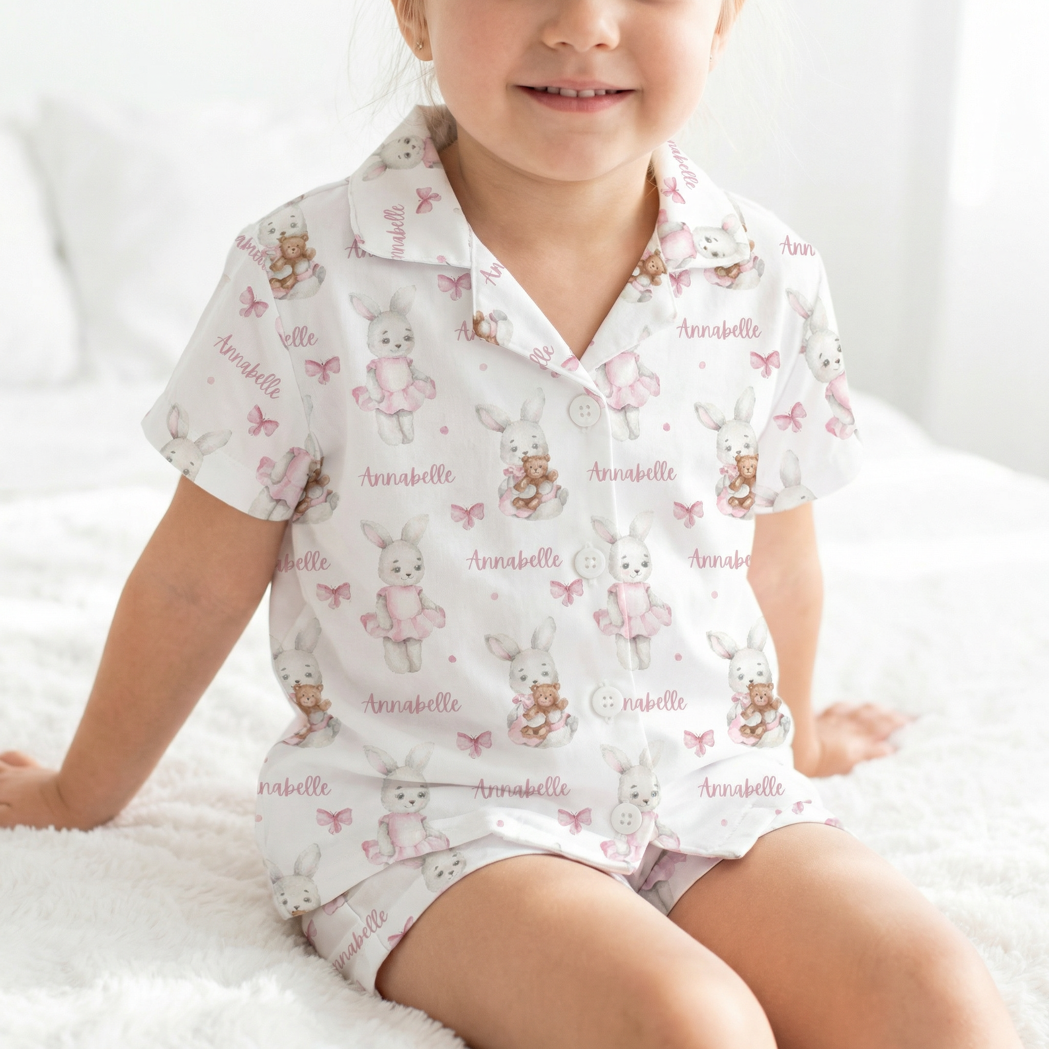 Personalised short sleeve kids pyjamas with name and all-over print design for comfortable warm-weather sleepwear