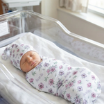 Personalised baby swaddle and beanie set made from soft stretch poly fabric for cozy newborn comfort