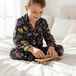 Long sleeve personalised kids pyjamas with all-over print and child's name on soft breathable fabric