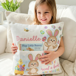 Personalised pink Easter pocket book cushion with bunny design and built-in book pocket