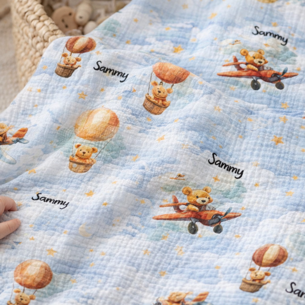Personalised muslin swaddle wrap with baby name, soft breathable fabric, 120x120cm for newborn comfort and cuddles