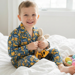 Personalised kids' long sleeve Easter pyjamas with all-over festive print and custom name