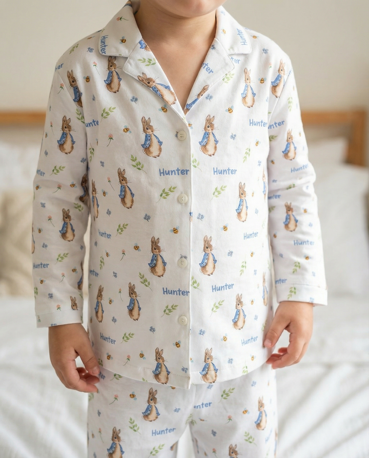 Personalised long sleeve kids Easter pyjamas with all-over festive print and child’s name