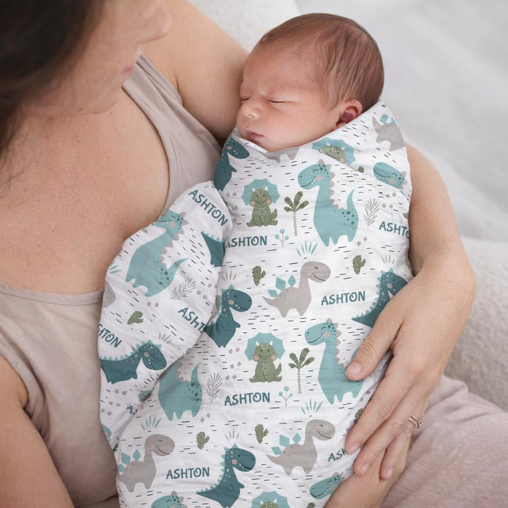 Personalised muslin swaddle wrap with baby name, soft breathable fabric, 120x120cm size, suitable for newborns and babies