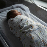 Personalised muslin swaddle wrap with baby name, soft breathable fabric, 120x120cm, ideal for newborns and gifts