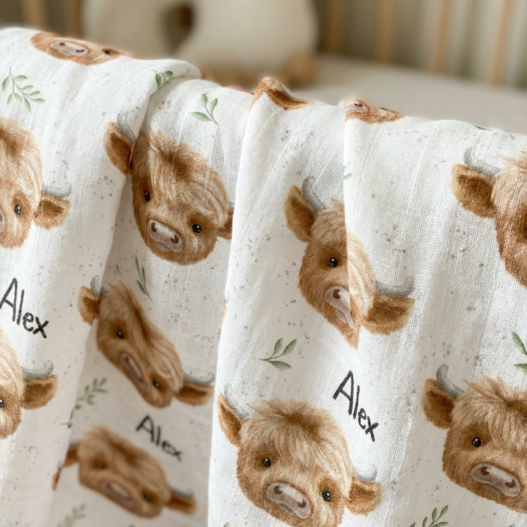 Personalised muslin swaddle wrap with custom baby name, soft breathable fabric, 120x120cm size.