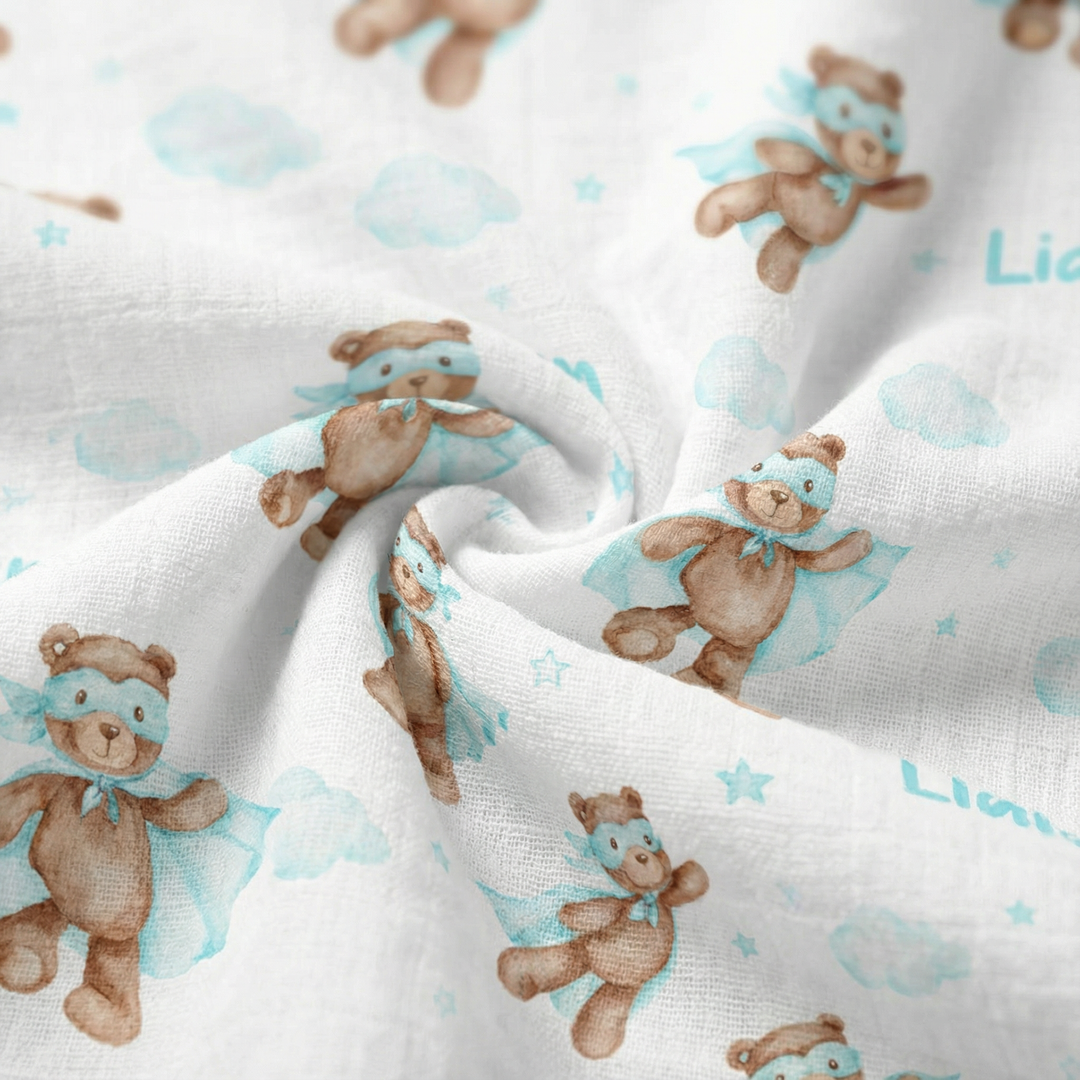 Personalised muslin swaddle wrap with baby’s name, soft breathable fabric, 120x120cm for newborn comfort and gifting