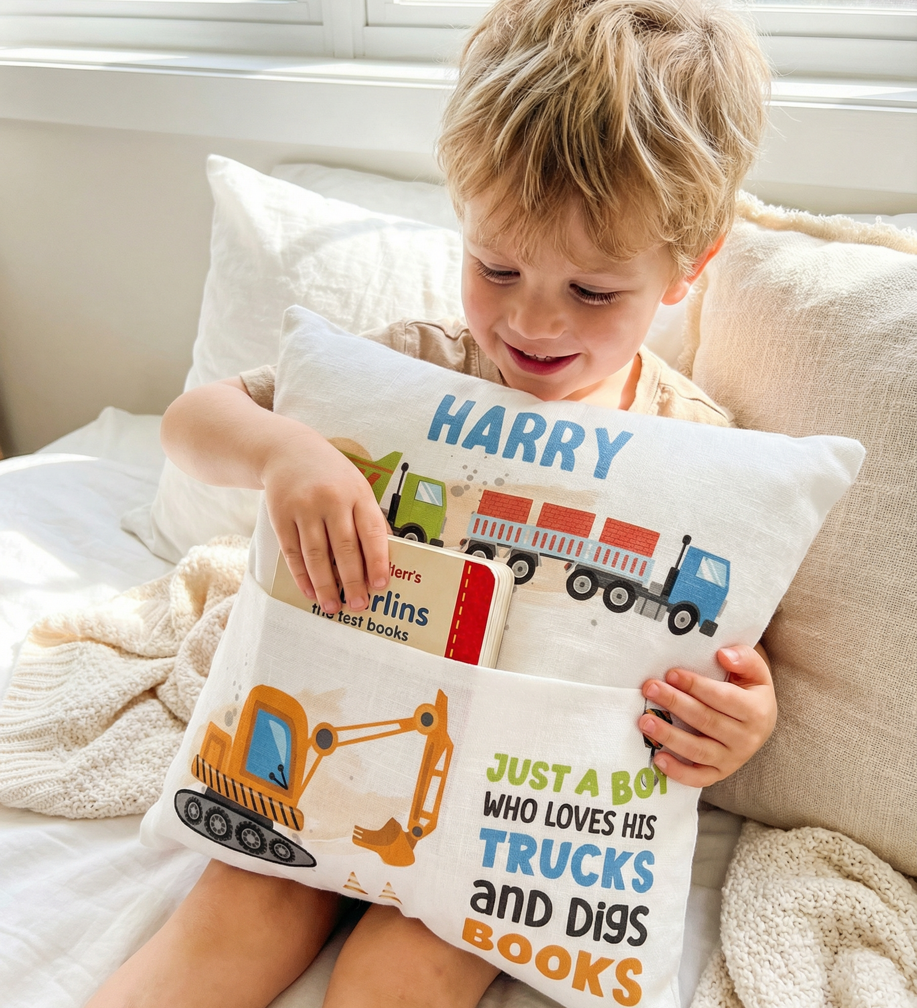 Personalised truck pocket book cushion with construction design and built-in pocket for kids' books