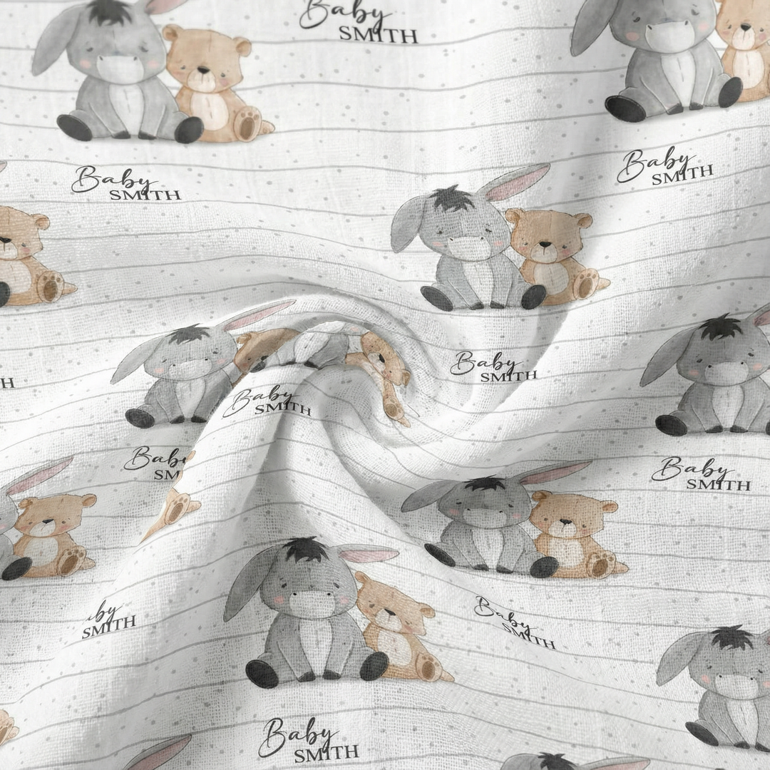 Custom muslin swaddle wrap personalized with baby’s name, soft breathable fabric, 120x120cm size for newborn comfort and gift.