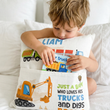 Personalised truck pocket book cushion with child's name and construction vehicle design