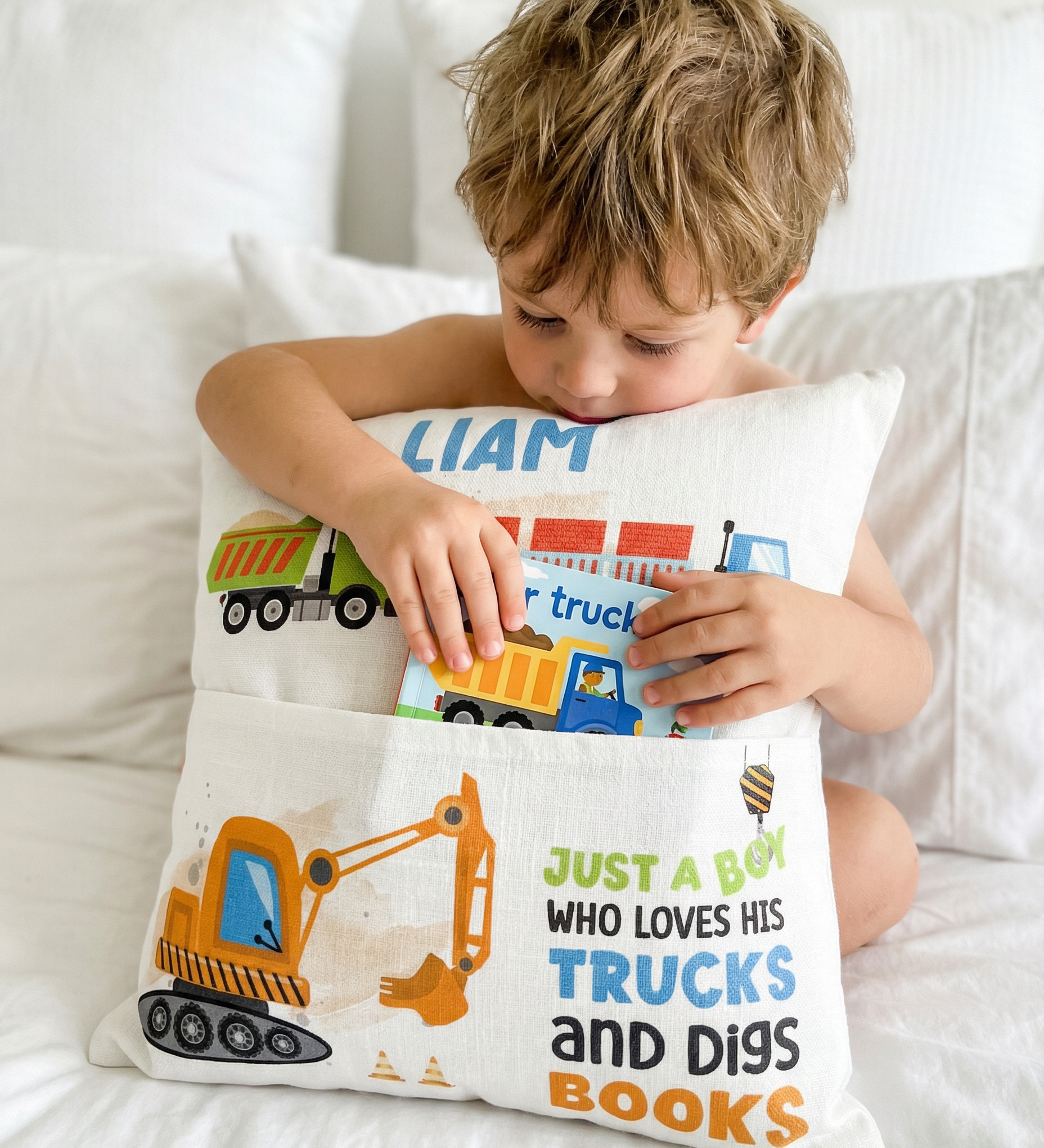 Personalised truck pocket book cushion with child's name and construction vehicle design