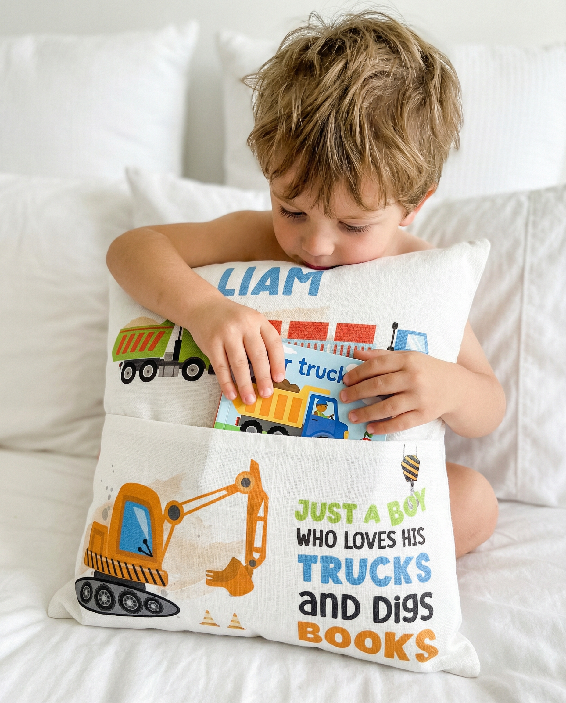 Personalised truck pocket book cushion with child's name and construction vehicle design