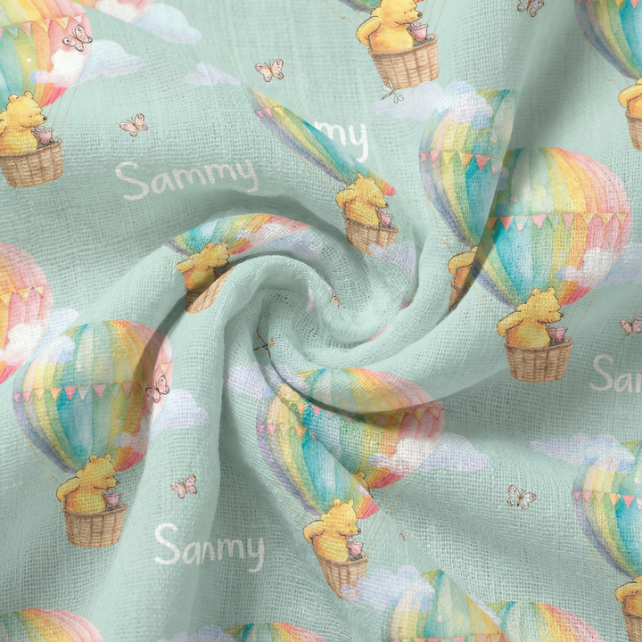 Personalised muslin swaddle wrap with baby name, soft breathable fabric, 120x120cm, perfect for newborn comfort and gifting