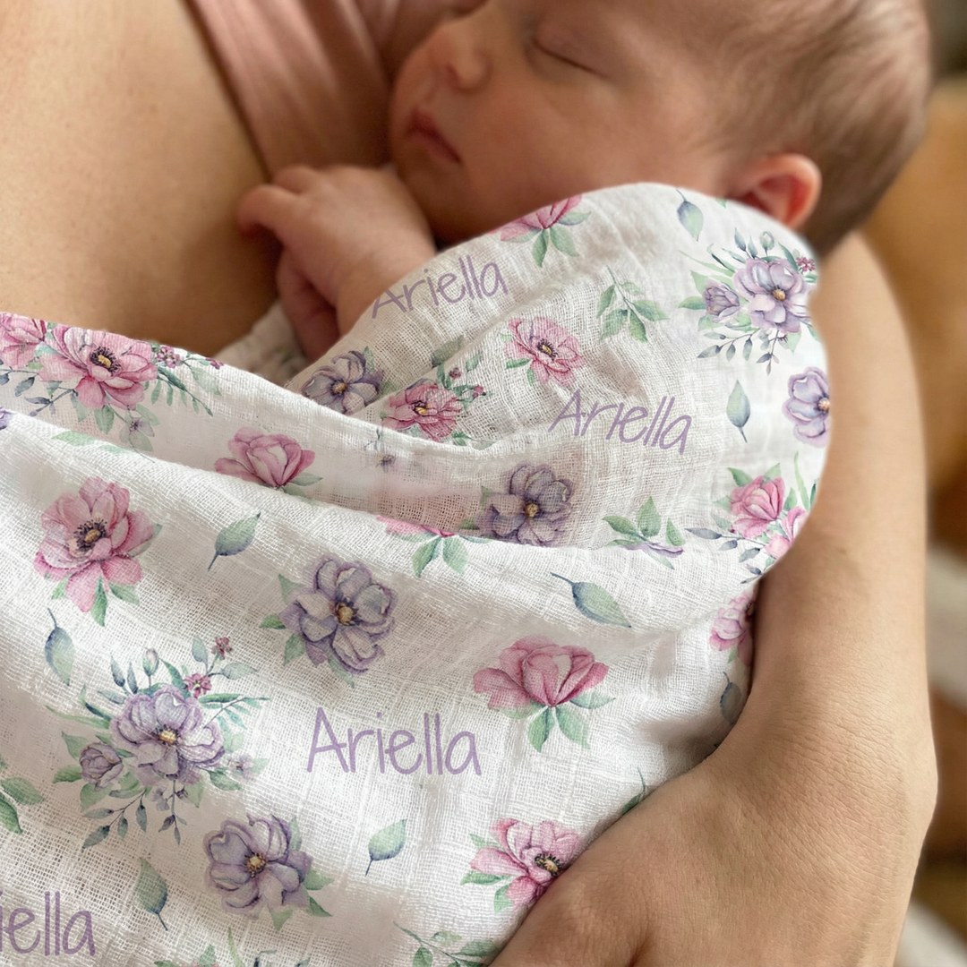 Personalised muslin swaddle wrap with baby name, soft breathable fabric, 120x120cm, perfect for newborn comfort and gifting