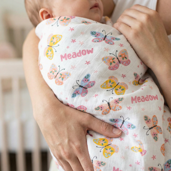 Personalised muslin swaddle wrap with baby name, soft breathable fabric, 120x120cm size for newborns