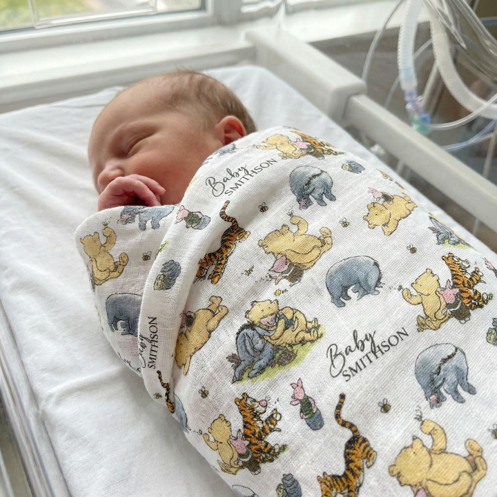 Personalised custom muslin swaddle wrap with baby name, soft and breathable fabric, 120x120cm size for newborns.