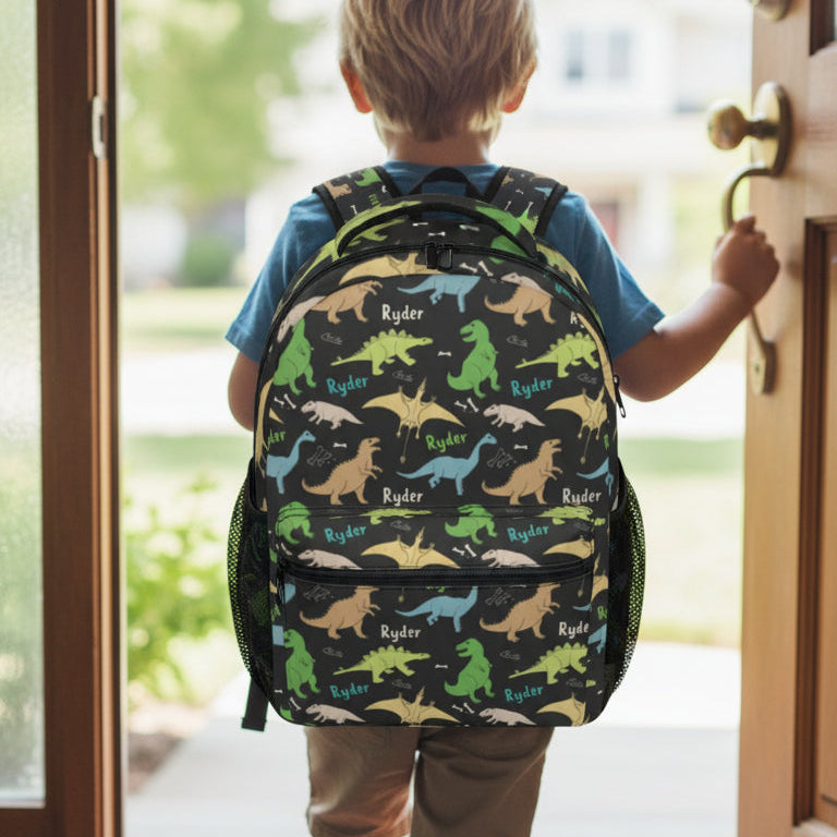 Child with a dinosaur-patterned backpack standing at a door.