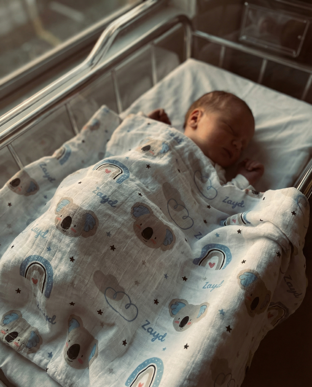 Personalised muslin swaddle wrap with baby’s name, soft breathable fabric, 120x120cm size