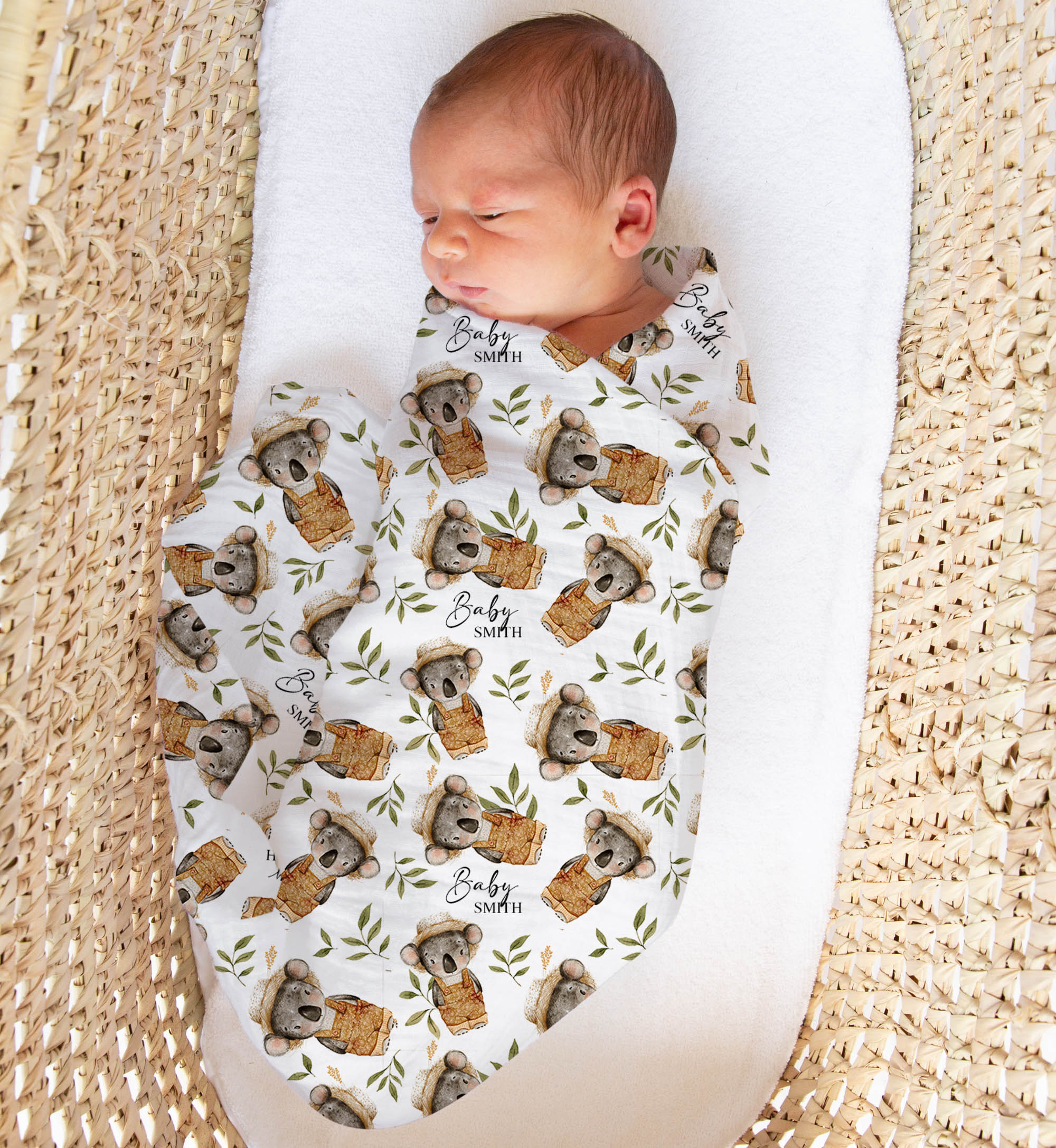 Custom muslin swaddle wrap personalized with baby’s name, made from soft breathable fabric, ideal for newborns.
