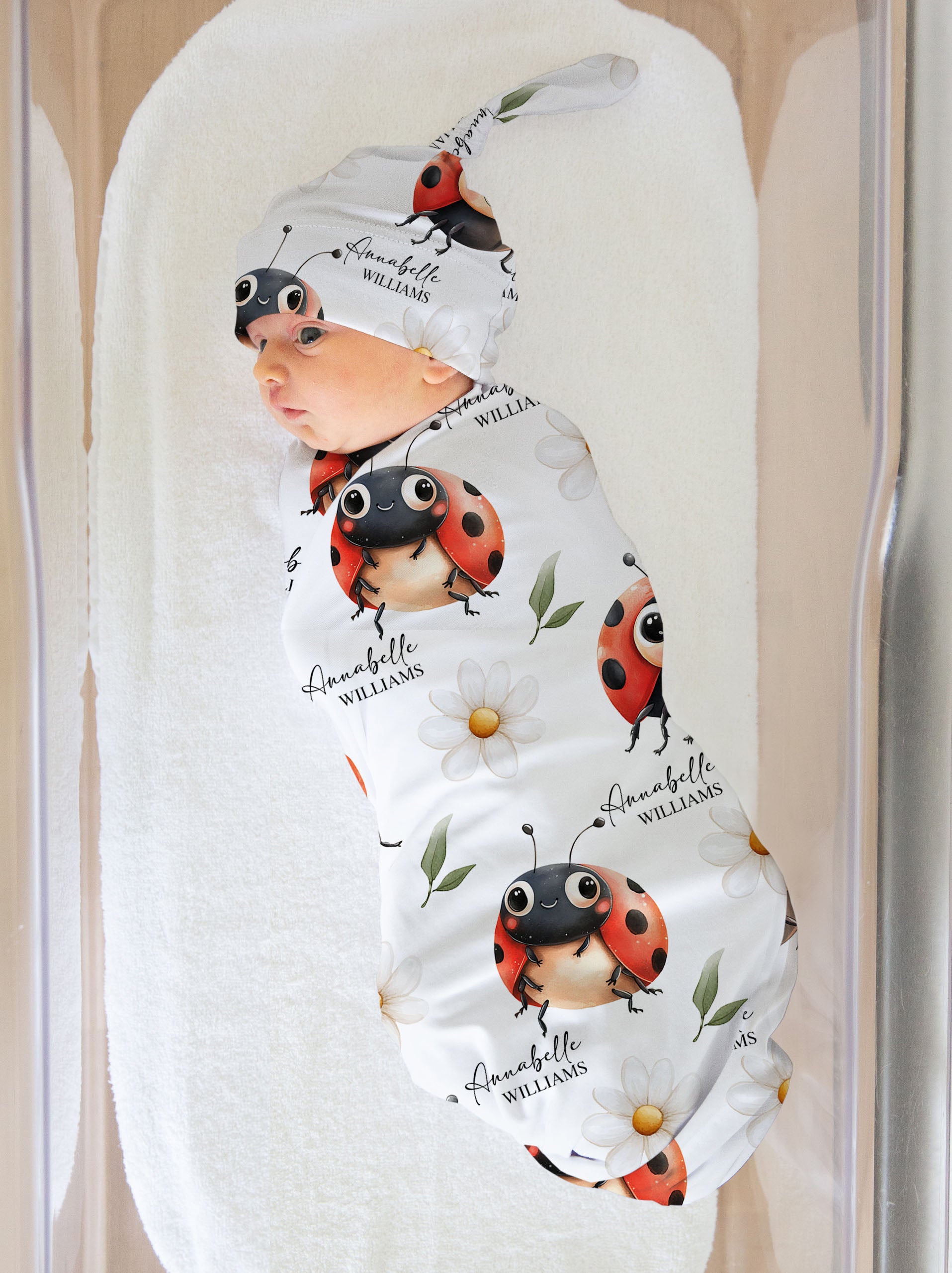personalised swaddle with ladybug design