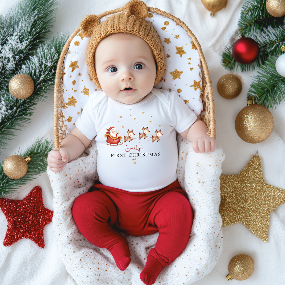 Keepsake Christmas onesie for baby’s first holiday season, featuring cute reindeer print