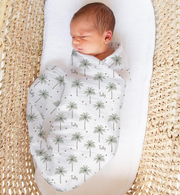 Personalised muslin swaddle wrap with baby name, soft breathable fabric, 120x120cm size, perfect for newborns and cuddles