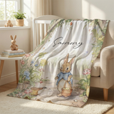 Personalised Peter Rabbit blanket with custom name, ultra-soft fabric, and classic illustrations for nursery warmth and comfort
