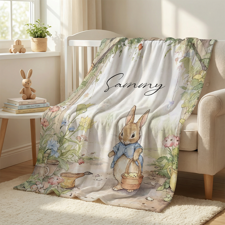 Personalised Peter Rabbit blanket with custom name, ultra-soft fabric, and classic illustrations for nursery warmth and comfort