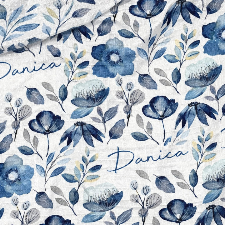 Personalised muslin swaddle wrap with baby name, soft breathable fabric, 120x120cm, ideal for newborns and versatile use