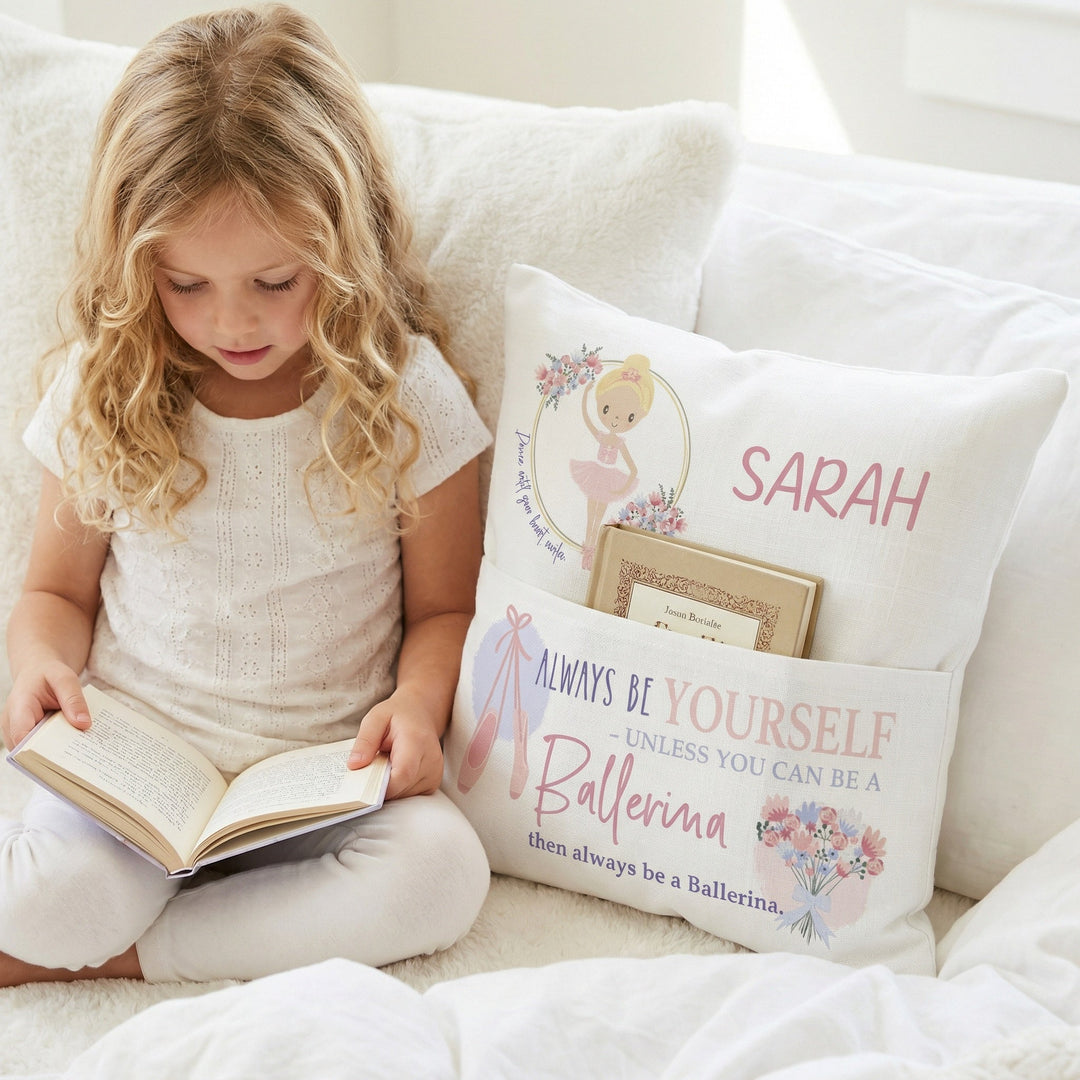 Personalised ballerina pocket book cushion with child’s name and built-in book pocket in pastel tones