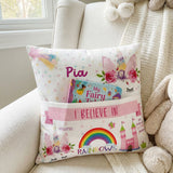 Personalised unicorn pocket book cushion with pastel unicorn design and name, featuring built-in book pocket for kids.