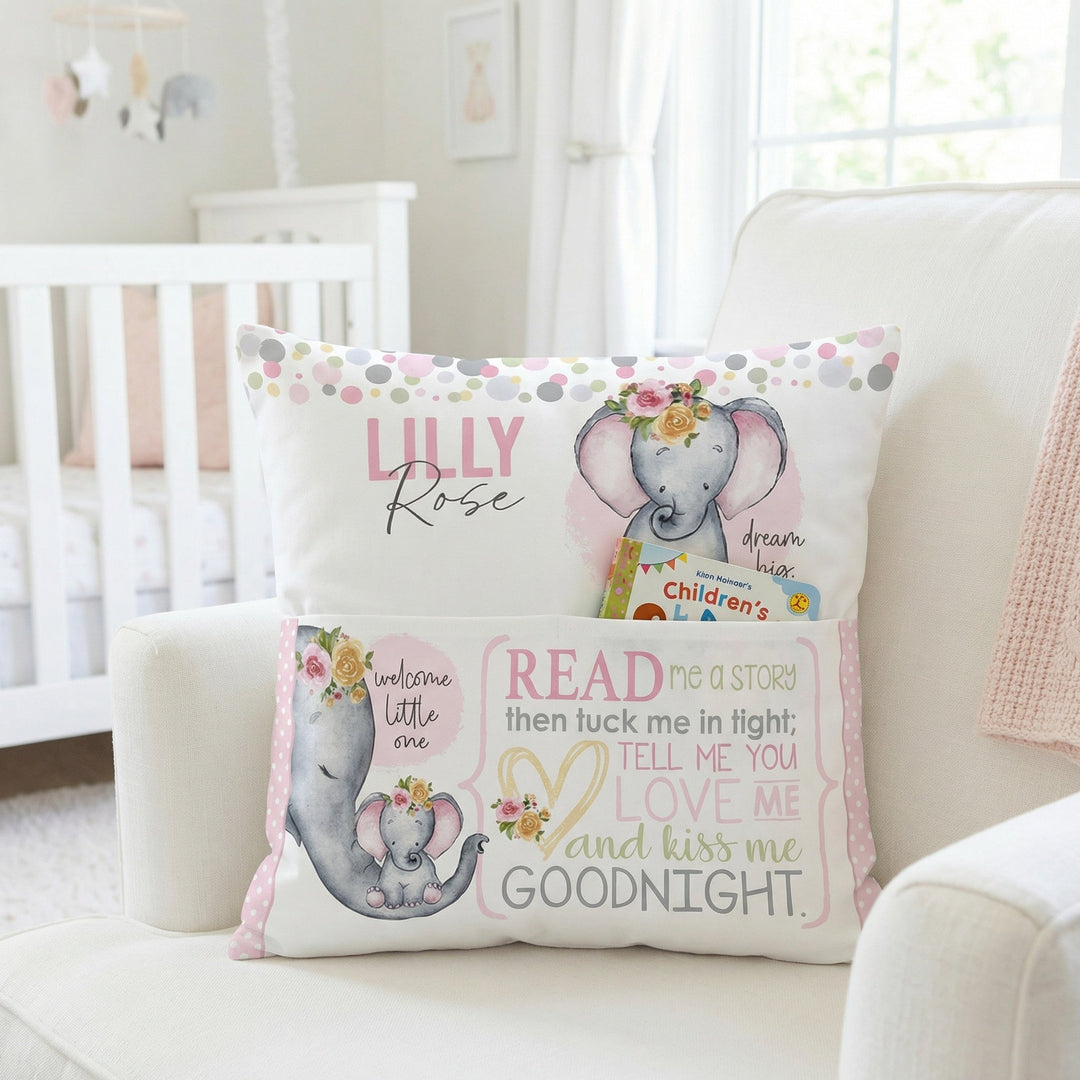 Personalised pink baby elephant pocket book cushion with built-in book pocket and child's name on front
