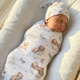 Personalised baby swaddle and beanie set made from soft stretch poly fabric for newborn comfort and style