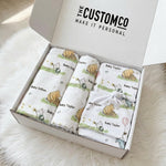 Personalised newborn essentials gift bundle with minky blanket, jersey swaddle, beanie, muslin swaddle, and 6-in-1 nursing cover baby box